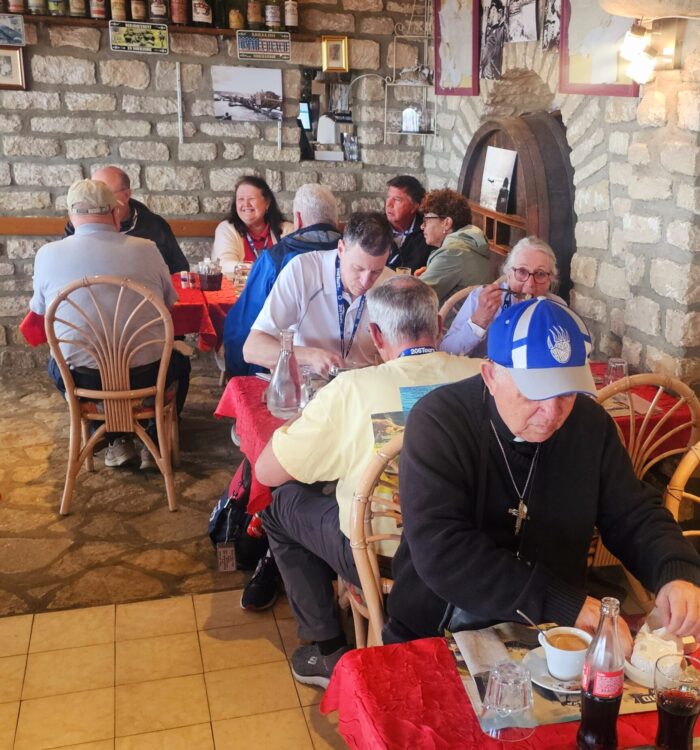 Fr. Clay Eating Lunch at Normandy Beach