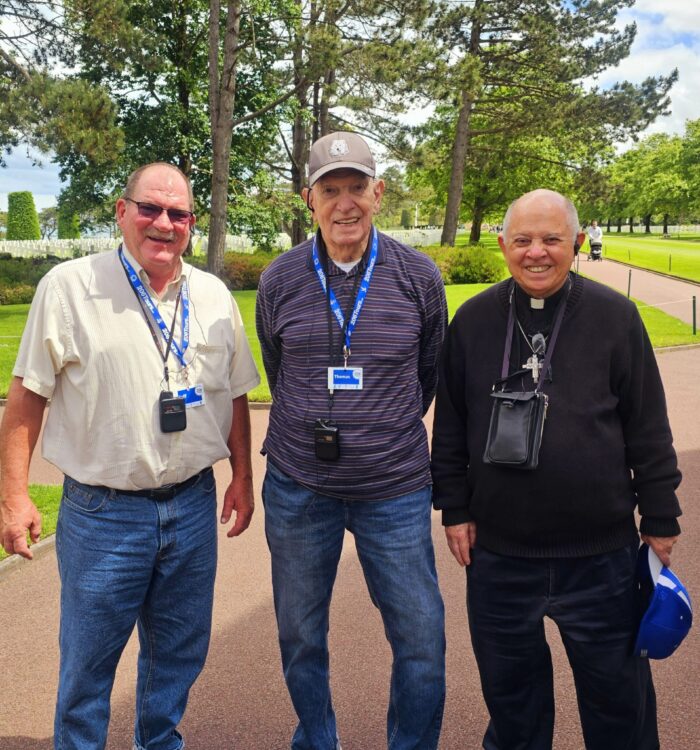 Fr. Clay with some of the pilgrims at Normandy