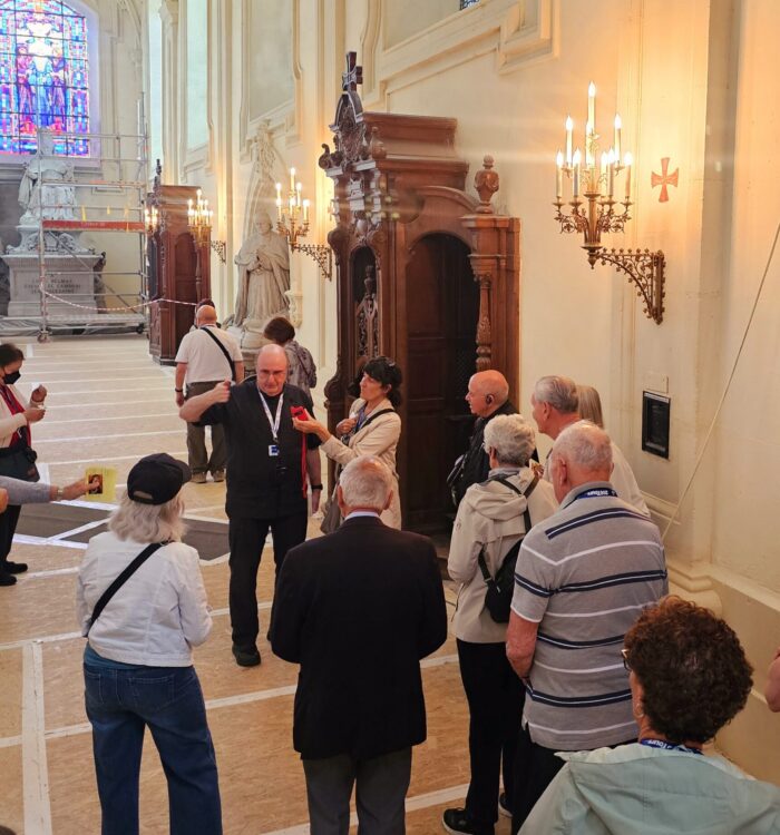 Fr. Kevin talking with pilgrims